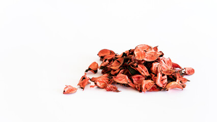 Dried rose petals on white background