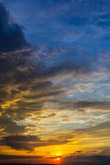 Fototapeta premium sunset sky with multicolor clouds. Dramatic twilight sky background