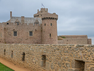 Beautiful old castle Fort La Latte is located on a peninsula and the only access to the fort is via the drawbridge, Cap Frehel, Brittany, France