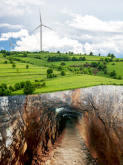 wind turbines and coal mine, energy transition concept