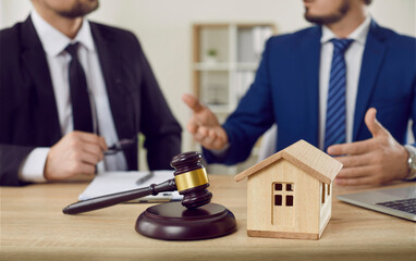 Male entrepreneur gets legal consultation from professional property lawyer. Business man and...