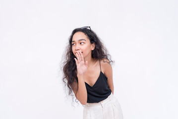 An excited woman wanting to share the latest gossip. Looking to share a story while looking around,...