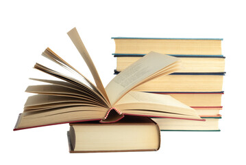 Several hardcover books in a stack and one opened isolated on a white background.