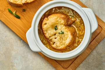 Classic French onion soup in a plate. Selective focus, close-up