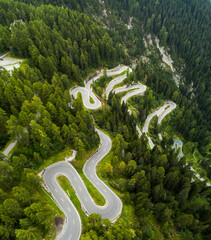 Aerial view of  Snaking Mountain pass, Switzerland. Maloja Pass.  Perfect for Roadtrips!