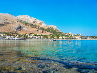 Fototapeta premium Sferracavallo, Province of Palermo, Sicily, Italy. With rocky coast and blue sea, coastal stones and nobody. Here on a sunny day.