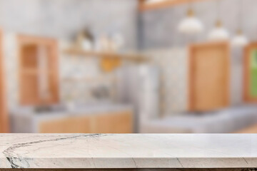 Empty marble top table with blurred kitchen interior Background. for product display.
