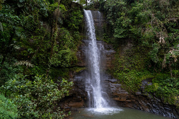 Fototapeta na wymiar Beautiful and incredible waterfall in Ecuador
