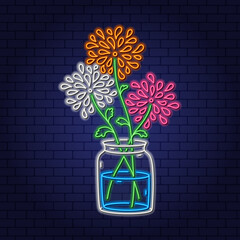 Neon bouquet of bright autumn chrysanthemums in a transparent glass vase with water. Flowering plants with stem and leaves are a gift for mom and girlfriend. Vector doodle illustration