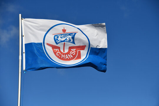 Garlstorf, Lower Saxony, Germany - September 16, 2022: Flag of German football club FC Hansa Rostock against blue sky in Garlstorf, Germany - FC Hansa is currently playing in the 2nd Bundesliga