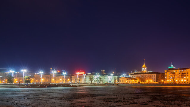 Embankment of the central pond and Plotinka in Yekaterinburg at Early Spring night. The historic center of the city of Yekaterinburg, Russia,
