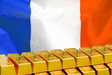 Row of shining golden bullions on the Georgia flag background. Business and financial countrys reserves. Concept of gold reserve and gold fund of Georgia