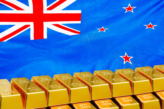 Row Of Shining Golden Bullions On The New Zealand Flag Background. Business And Financial Countrys Reserves. Concept Of Gold Reserve And Gold Fund Of New Zealand