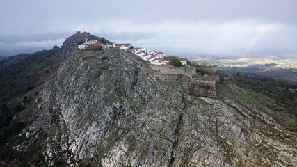 Aerial drone view of Marvao, Historic Villages of Portugal. Castle and old town inside of a fortified wall on the cliff of a mountain. Rural tourism. Holidays. Best destinations in the world.
