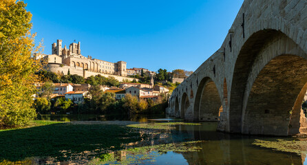Old bridge over the Orb river and Saint Nazaire cathedral in Béziers, Hérault, Occitanie, France