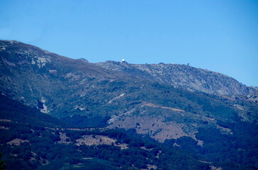 Autumn view of the highest peaks and old buildings of Vitosha mountain near Sofia, Bulgaria  