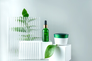 anti-aging collagen facial serum in green glass bottle and face cream on white podium background with copy space. Natural Organic Cosmetic Beauty Concept. Mockup for branding