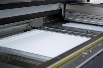 White polyamide powder for printing powder 3d printer close-up. Powder for high-speed printing of 3D printer on working surface inside printer. New modern printing technology. Multi Jet Fusion MJF