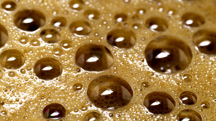 foam with bubbles on coffee	
