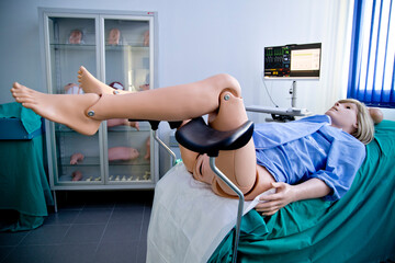 latex female mannequin used in midwifery schools for advanced simulation