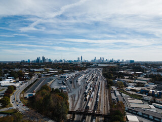 Aerial of City Skyline and Train Yard  in Autumn 