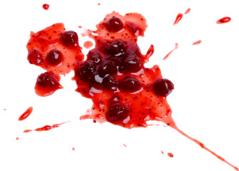 splash of cranberry jam on white background