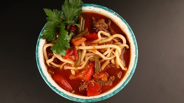 Traditional dish with noodles. Lagman.