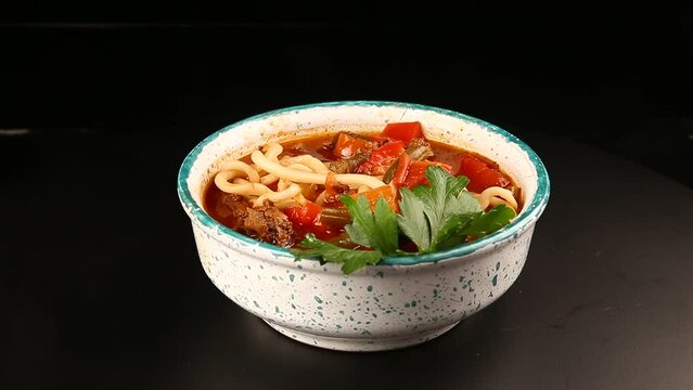 Traditional dish with noodles. Lagman.