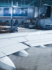 Airplane wing at aerospace industry