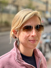 Close-up portrait of woman in sunglasses