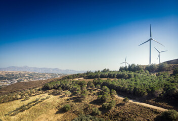 Scenic view of landscape with wind turbines