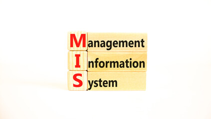 MIS management information system symbol. Concept words MIS management information system on wooden blocks on beautiful white background. Business MIS management information system concept. Copy space © Dzmitry