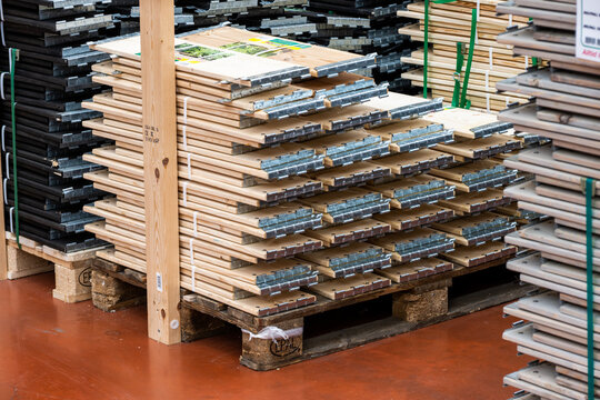 Gothenburg, Sweden - July 07 2022: Stack of pallet frames for use in gardening on a pallet at a gardening warehouse.