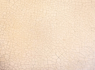 Distressed cracked wallpaper. Rough wall surface texture background. 