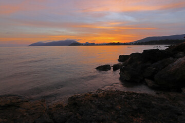Obraz premium Sunset over Santa Eulalia from Cala Talamanca beach, Ibiza, Balearic Islands, Spain.