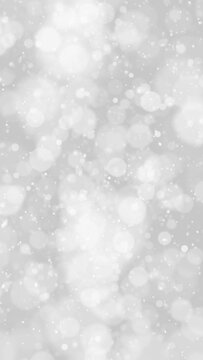 Magical festive silver gray winter bokeh background with falling snowflakes and stars animation background. Concept holidays new year and christmas.	