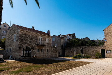 Port captain building and the Statue of Augustin Kazotic near the Dominic church. Trogir, Croatia.