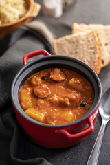 The cabbage soup in pot. Healthy vegetable soup.