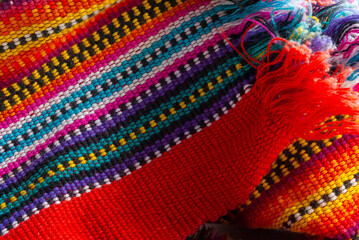 Detail of handmade textile by Mayan Indians in Guatemala, colorful cotton, ancestral cosmology. - 544981320