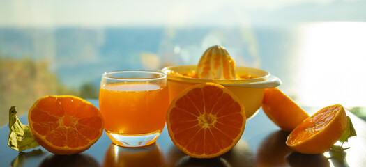 Drink. Tangerines and manual citrus juicer