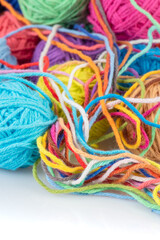 Colorful woolen yarn balls close-up