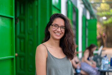 Young woman wearing glasses at a party 