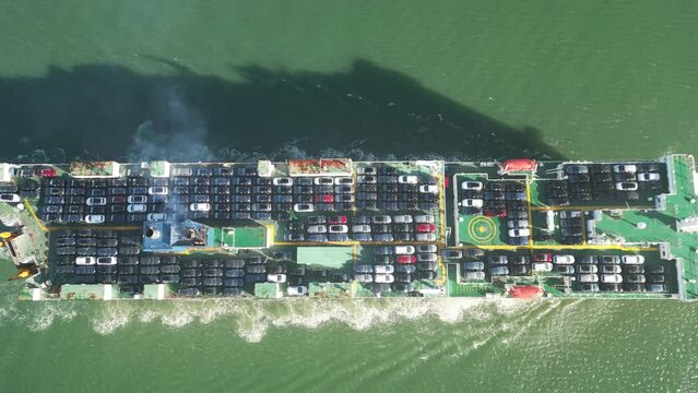 Vessels for transporting cars and ro-ro boats. View from above. The ship delivers new cars