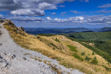 Fototapeta na wymiar Footpath to Stoletov peak on Shipka Pass in Balkan Mountains, Bulgaria
