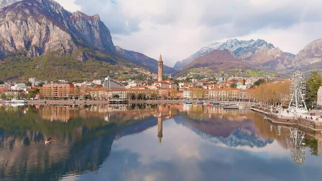 Aerial beautiful sunset cityscape of Lecco town, Lombardy, Italy, Europe
