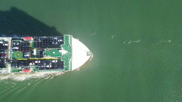 Vessels for transporting cars and ro-ro boats. View from above. The ship delivers new cars