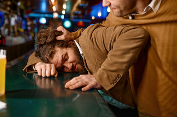Aggressive man pulling guy on bar counter