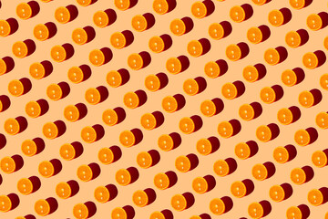 Orange pattern on a orange background. Pop art design, creative citruses. Yellow lemon, minimal flat style.
