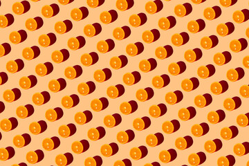 Orange pattern on a orange background. Pop art design, creative citruses. Yellow lemon, minimal flat style.