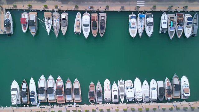  bird's eye view yacht boats in harbor. Tranquil aerial view flight ibiza Spain